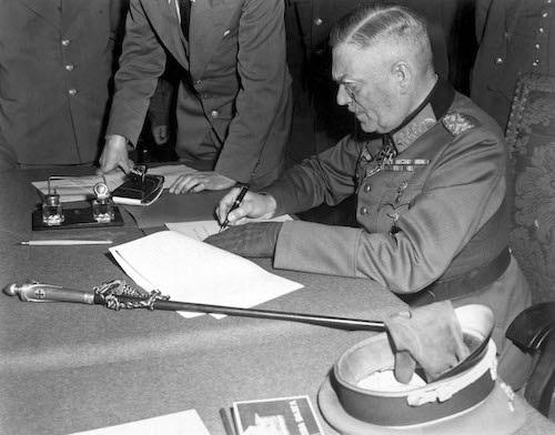 Field Marshall Wilhelm Keitel, signing the ratified surrender terms for the German Army at Russian Headquarters in Berlin, Germany, May 7, 1945. Lt. Moore. (Army) NARA FILE #: 111-SC-206292 WAR & CONFLICT BOOK #: 1353