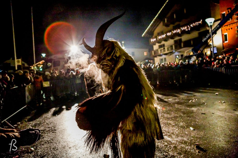 Please meet Krampus, Santa Claus’ shadow. Krampus is horrific beast that is half-demon and half-goat who, literally, beats children up from naughty to nice. Krampus isn’t exactly what you expect for Christmas, I assure you. Dark long fur, horns and fangs, this creature is St. Nicholas’ shadow and it comes with a chain and cow-bells that he whip about, along with a bunch of birch sticks meant to hit naughty children. It then kidnaps the bad kids and take them down to the underworld.