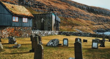 St. Magnus Cathedral started being built more than 700 years ago on the southernmost village on Streymoy. But it was never finished. Today, the building lays not completed, without a roof, suffering through all these years without any protection. But this ruined church still stands today making it the largest medieval building in Faroe Islands.