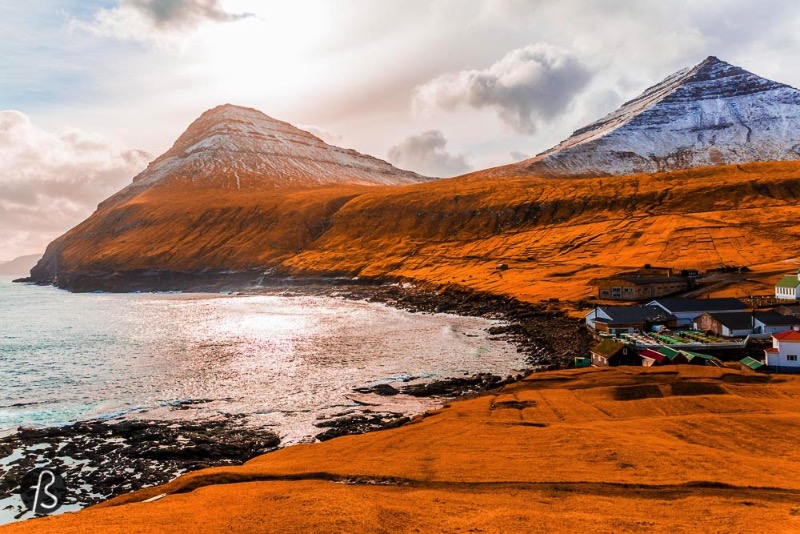 The gorge that gives name to the village is one of the best natural harbors in the Faroe Islands. But things are not that simple. Boats need to be pulled up on a ramp to keep them safe from the water. During the night, there are colorful lights all around and they make the gorge even more beautiful. An amazing opportunity to take even more pictures. 