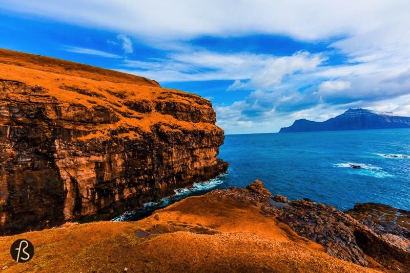 The gorge that gives name to the village is one of the best natural harbors in the Faroe Islands. But things are not that simple. Boats need to be pulled up on a ramp to keep them safe from the water. During the night, there are colorful lights all around and they make the gorge even more beautiful. An amazing opportunity to take even more pictures. 