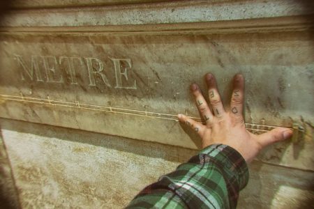 The last original standard meter is called mètre étalon in French and is a small piece of marble that can be found on a wall next to rue Vaugirard 36, across the street from the Senate at the Palais du Luxembourg. This is the only one of 16 that still exist today, and all of them were installed in 1791 when the Académie des Sciences defined what would be the meter.