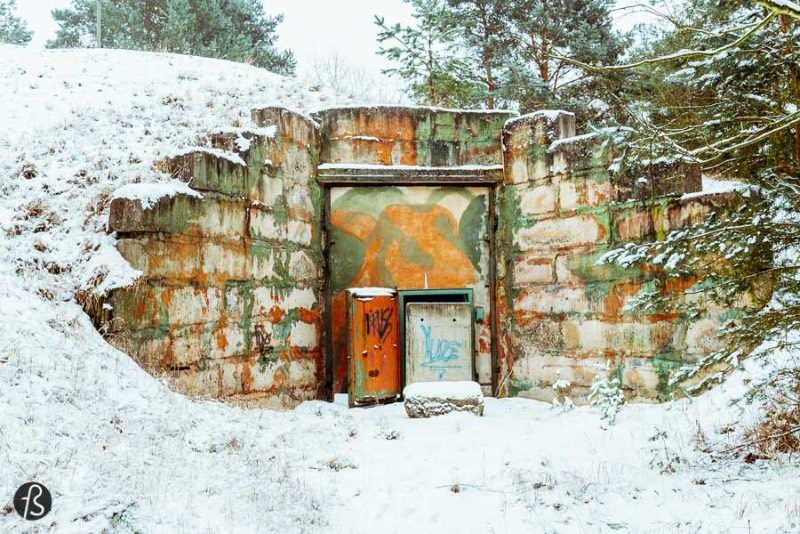 I went to explore Flugplatz Brand back in January 2017 when I went to Tropical Islands and realized that the area around the park used to be a military airfield. I looked for some pictures online and found a gold mine of urban military exploration with a Lenin mural, abandoned hangars, and bunkers. And everything seemed terrific covered in snow!