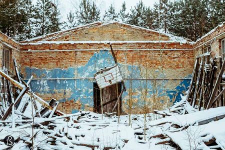 I went to explore Flugplatz Brand back in January 2017 when I went to Tropical Islands and realized that the area around the park used to be a military airfield. I looked for some pictures online and found a gold mine of urban military exploration with a Lenin mural, abandoned hangars, and bunkers. And everything seemed terrific covered in snow!