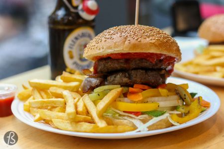 This week of the #52weeksofburgers challenge, we visit another market to eat burgers straight from the butcher shop at Piechas. Located at Marheineke Markethalle in Bergmannkiez; Piechas is a butcher shop and food stall with a variety of burgers and other meat specialties.