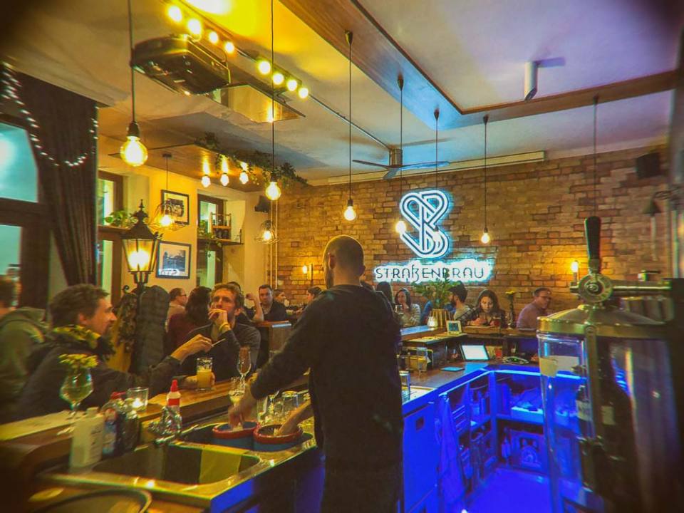 Strassenbräu is a craft beer bar in Friedrichshain that has one of the most exciting menus we have seen in the bars around town. Whether you a beer curious or a pro, you’ll like to try out the entire list there. I know we almost did this when we first visited the place.