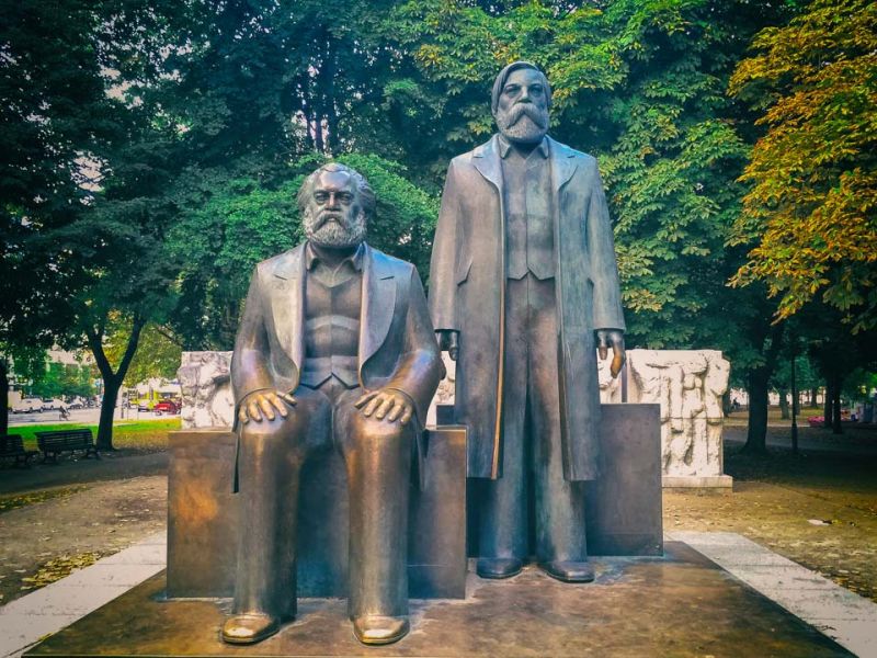 Marx and Engels Forum is a small public park in the heart of Berlin. Named after two of the most famous and influential German philosophers, Friedrich Engels and Karl Marx, authors of The Communist Manifesto. The park was opened to the public in 1986. The statues found there used to have quite a significant location with the Palast der Republik, the German Democratic Republic's parliament, on its back.