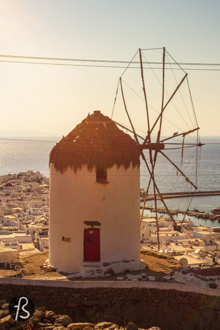 We were in Mykonos in the summer of 2021, exploring the Aegean sea island while onboard Running on Waves. When we reached Mykonos, we had a small list of places to visit, and the windmills of Mykonos were high on that list. Mainly because we have seen them online and they looked gorgeous and, second, because we visited windmills in Berlin before. This is something that we do whenever we travel somewhere.