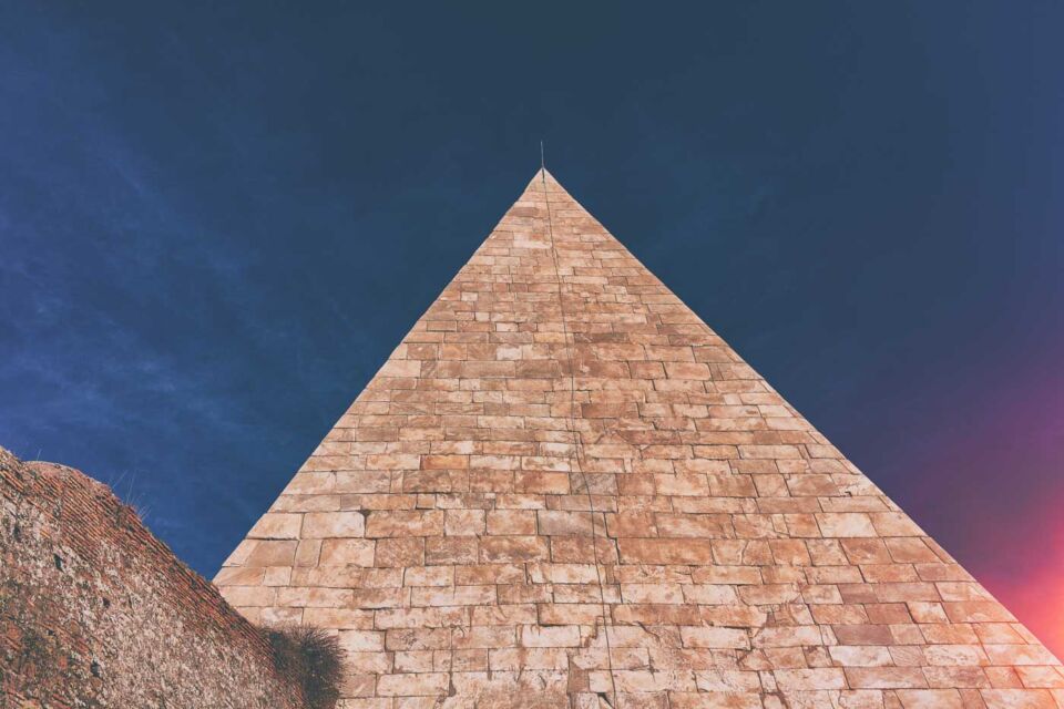 The Pyramid of Caius Cestius is an ancient pyramid-shaped monument in the Testaccio neighborhood of Rome, Italy. It was built as a tomb for the Roman magistrate and priest Caius Cestius in 12 BC, during the reign of Emperor Augustus.