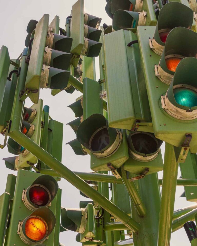 If you're looking for a unique and slightly puzzling attraction in London's Canary Wharf, look at the Traffic Light Tree. This eight-meter-tall sculpture, resembling a tree with 75 sets of traffic lights, is a sight to behold. It would be photogenic at night when its lights create a dazzling and colorful display.