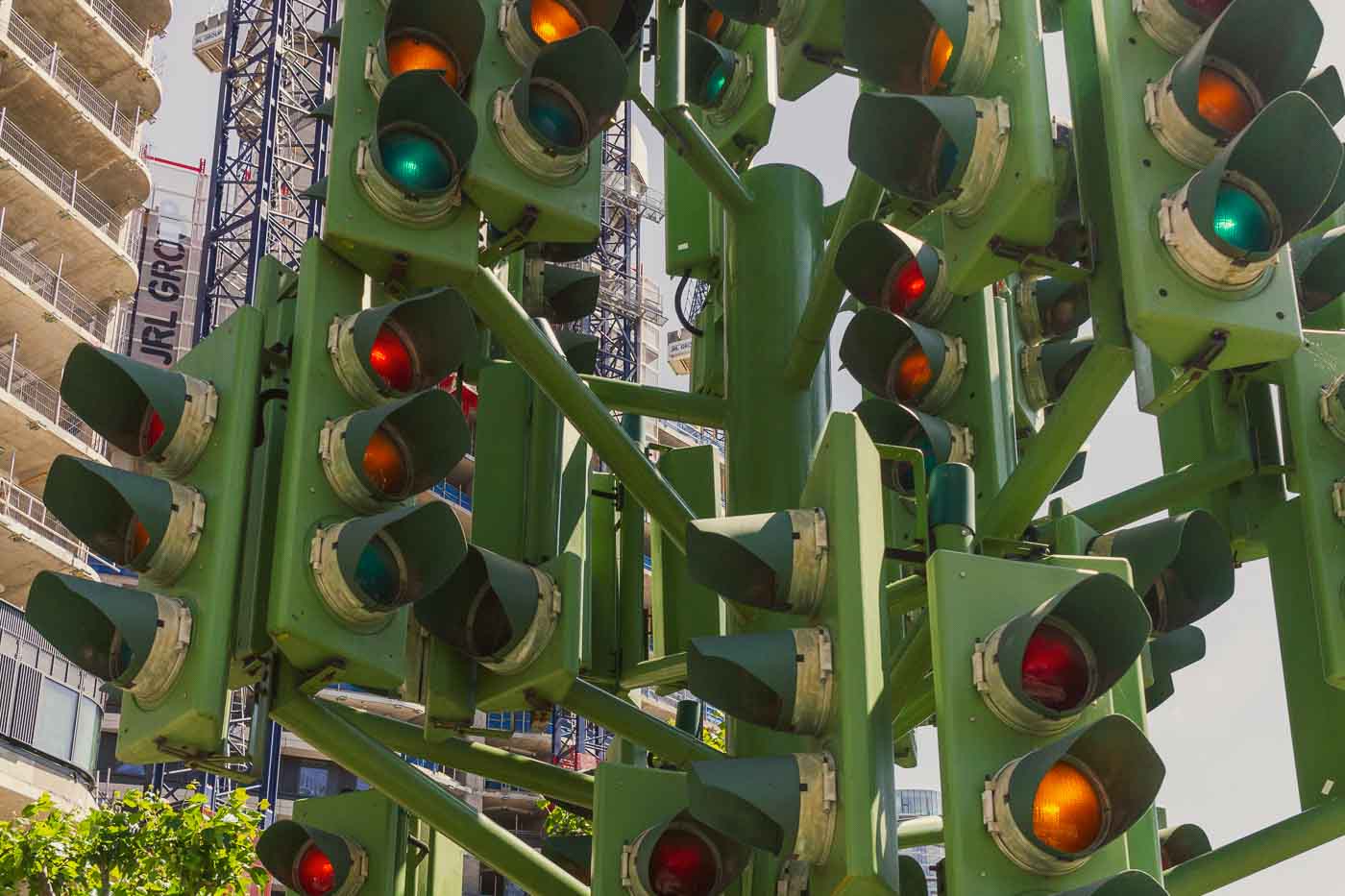 If you're looking for a unique and slightly puzzling attraction in London's Canary Wharf, look at the Traffic Light Tree. This eight-meter-tall sculpture, resembling a tree with 75 sets of traffic lights, is a sight to behold. It would be photogenic at night when its lights create a dazzling and colorful display.