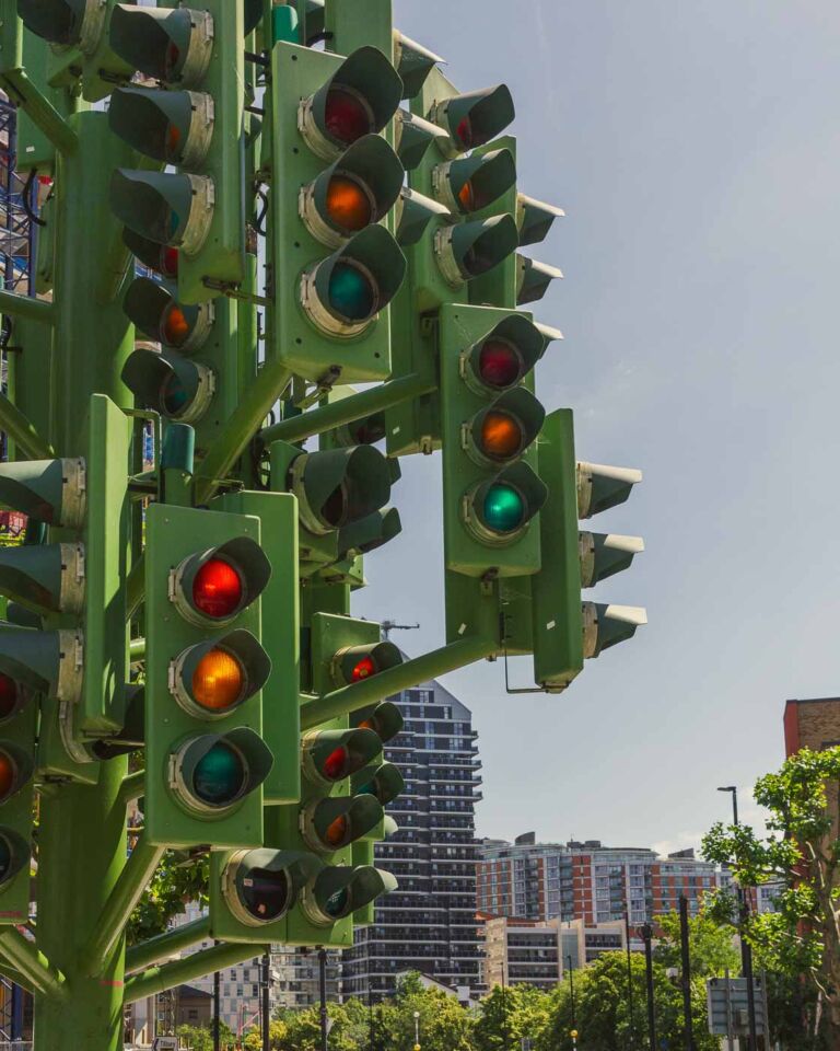 If you're looking for a unique and slightly puzzling attraction in London's Canary Wharf, look at the Traffic Light Tree. This eight-meter-tall sculpture, resembling a tree with 75 sets of traffic lights, is a sight to behold. It would be photogenic at night when its lights create a dazzling and colorful display.