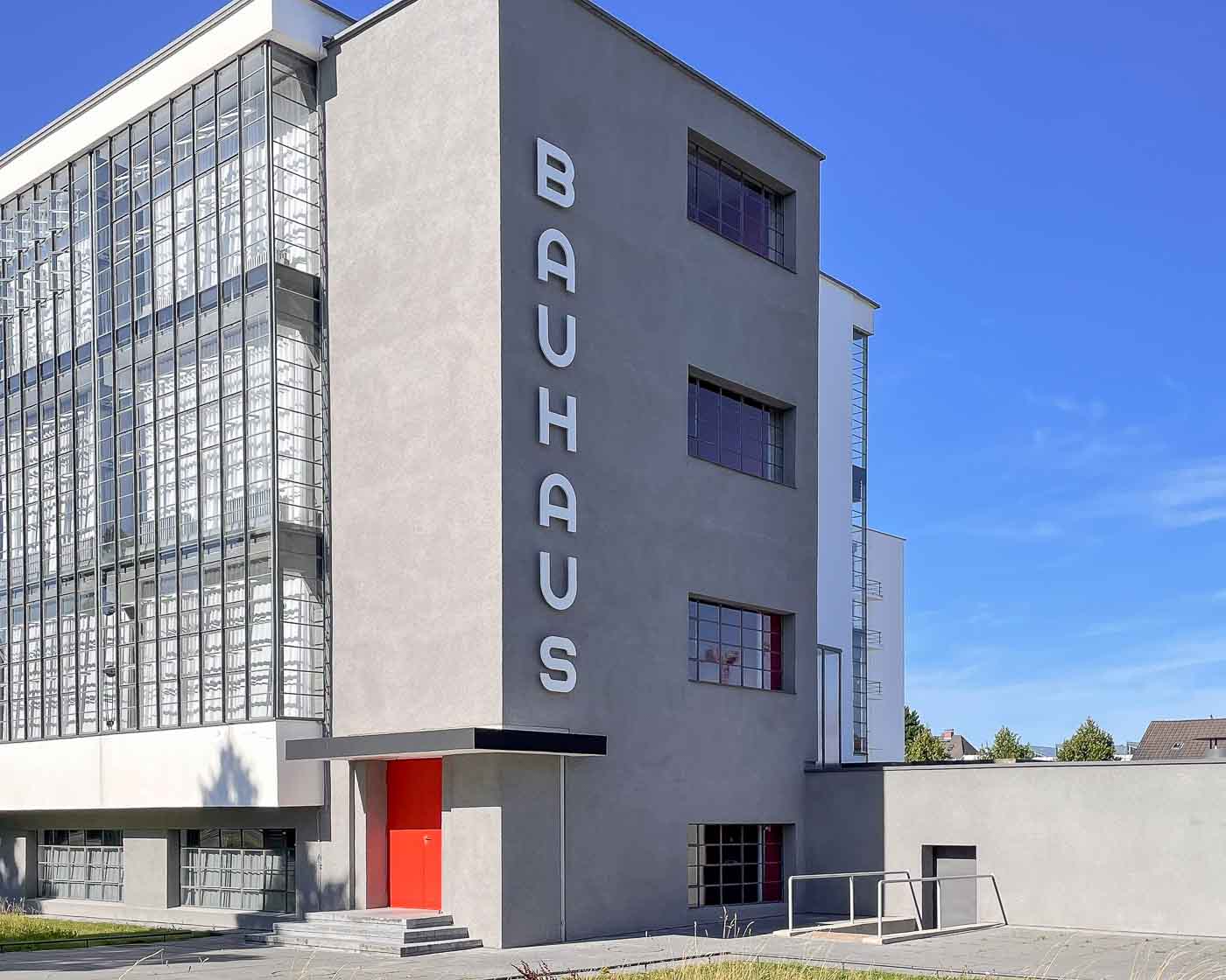 When I first visited the Bauhaus school in Dessau, one thing was missing: the Bauhaus sign that appears in most school images. That part of the building was covered with a tarp, and a replacement sign was in place. For years, I wondered when the original sign would be back in place, and I had an answer to that question in the summer of 2024. 