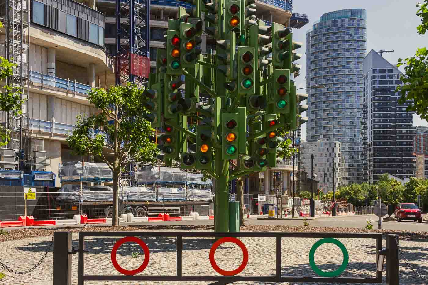 If you're looking for a unique and slightly puzzling attraction in London's Canary Wharf, look at the Traffic Light Tree. This eight-meter-tall sculpture, resembling a tree with 75 sets of traffic lights, is a sight to behold. It would be photogenic at night when its lights create a dazzling and colorful display.