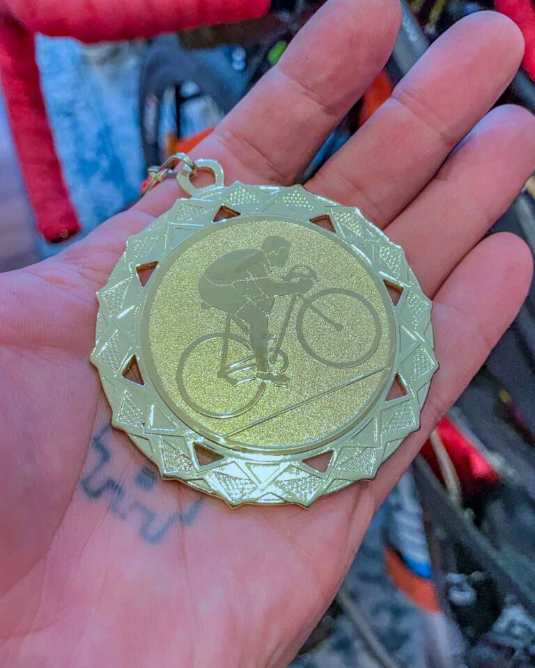 I talked to my girlfriend before and asked her to help me take my last picture with my bike next to Rathaus Neukölln just to mark my way home. And, before she took the photo, she gave me a medal!