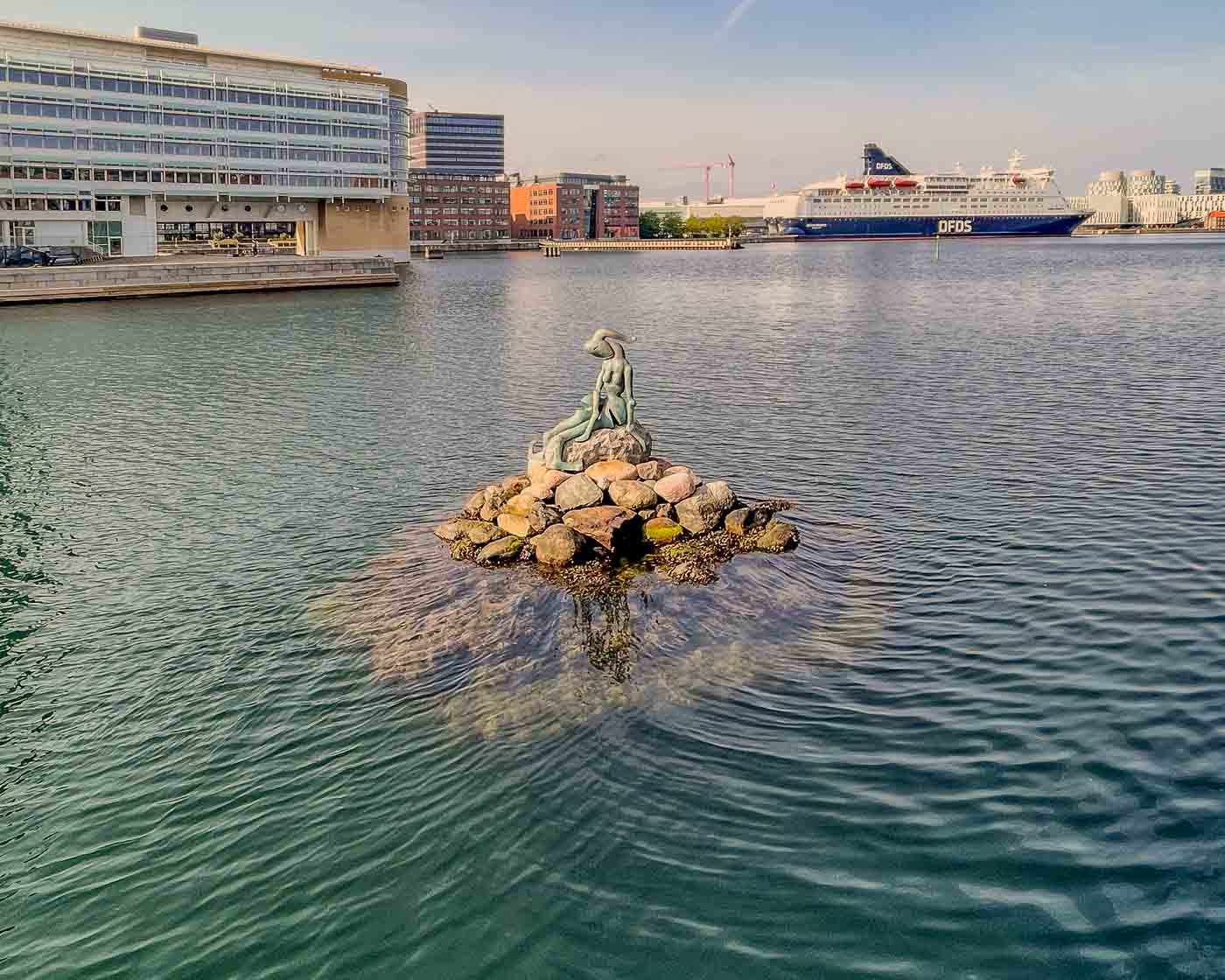 The Genetically Modified Little Mermaid is a thought-provoking sculpture by Bjørn Nørgaard. It’s definitely not your typical Little Mermaid; the sculpture is just one figure in a larger sculpture group called “The Genetically Modified Paradise” that can be found in a square called Dahlerups Pakhus.