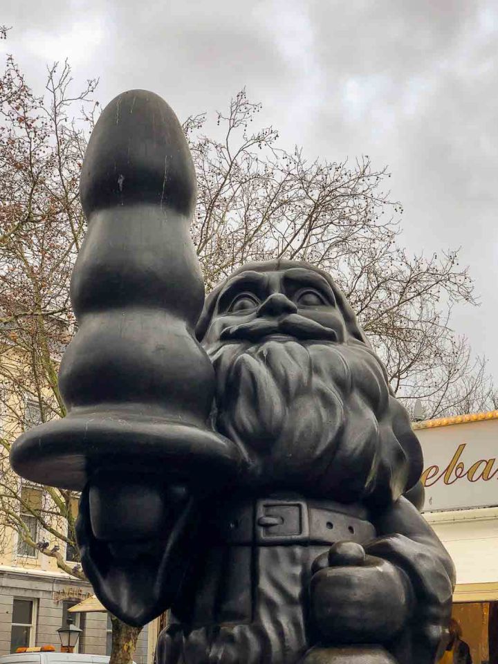 Rotterdam, a city known for its modern architecture and vibrant art scene, is also home to one of the most controversial statues in the world: the Rotterdam Santa Claus. This seemingly jolly Santa, instead of holding a Christmas tree, is clutching a butt plug, causing quite a stir among locals and tourists alike.