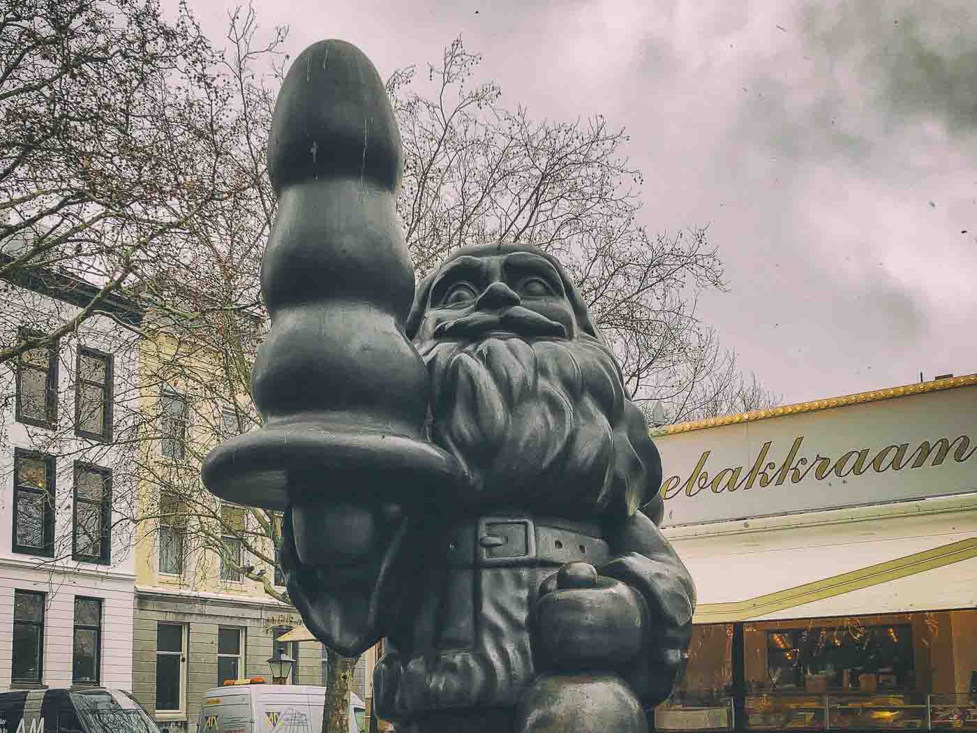 Rotterdam, a city known for its modern architecture and vibrant art scene, is also home to one of the most controversial statues in the world: the Rotterdam Santa Claus. This seemingly jolly Santa, instead of holding a Christmas tree, is clutching a butt plug, causing quite a stir among locals and tourists alike.