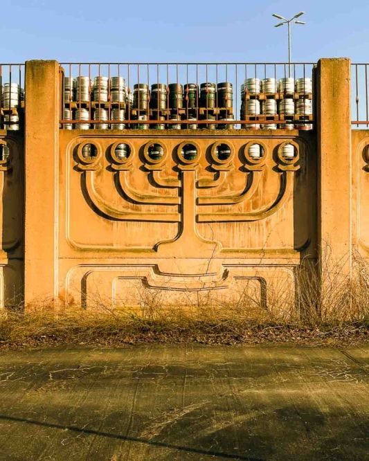 In the sprawling district of Weissensee, a quiet giant rests, where time seems to slow, and the whispers of history echo through the trees. This is the Jewish Cemetery in Berlin-Weissensee, a 42-acre expanse that powerfully reminds the Jewish community of its journey through triumph and tragedy.