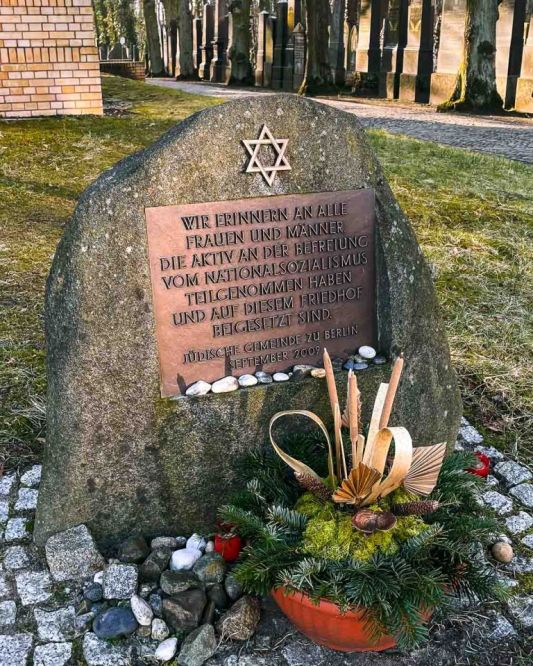 In the sprawling district of Weissensee, a quiet giant rests, where time seems to slow, and the whispers of history echo through the trees. This is the Jewish Cemetery in Berlin-Weissensee, a 42-acre expanse that powerfully reminds the Jewish community of its journey through triumph and tragedy.  