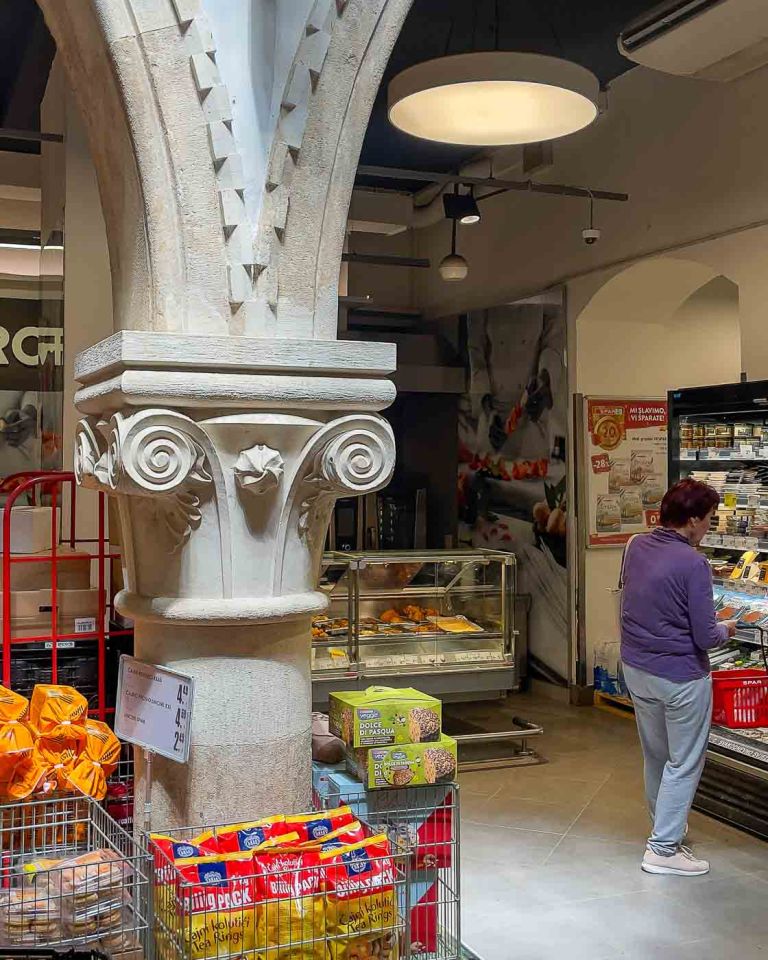 Split is a city where ancient Roman emperors once walked. Glowing white stone creates a labyrinthine old town, and unexpectedly, you can pick up your daily groceries in a building technically under UNESCO protection. Welcome to the curious case of the Unesco-protected Supermarket in Split, a SPAR grocery store that offers a shopping experience quite unlike any other in the world.
