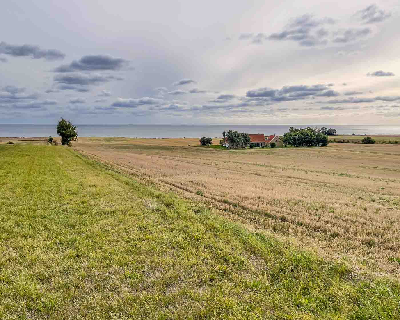 Imagine stepping back over 5,000 years, tracing the footsteps of our ancient ancestors, and exploring the very chambers where they laid their revered dead to rest. On the idyllic Danish island of Møn, you don't just imagine it—you can experience it. Møn is renowned for its remarkably preserved Denmark burial chambers, offering an unparalleled glimpse into the fascinating history of the Funnel Beaker culture.