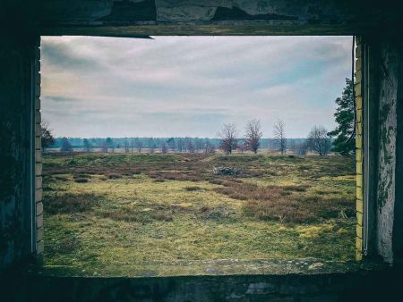 Just a short train ride from the booming city of Berlin lies a vast, quiet landscape with a storied past—the Döberitz Heide. What was once one of Germany’s most prestigious military training grounds is now a massive nature park. But if you look closely, leftovers of its dramatic history still peek through the forest foliage. For urban explorers, history buffs, and nature lovers alike, the Döberitz Heide bunkers and their surroundings offer a fascinating glimpse into an almost forgotten era.