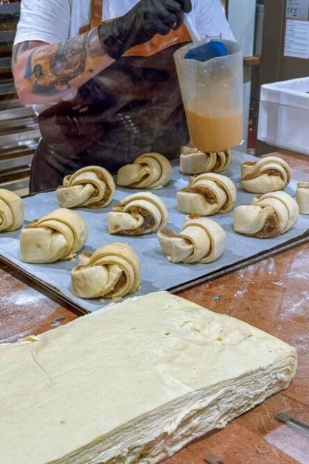 No trip to Poznan is complete without tasting the regional delicacy called the Rogal Świętomarciński, also known as the St. Martin’s Croissant. This tasty treat is made with a puff pastry, nuts, honey, and white poppy seeds, and it’s so important to the city that it has a protected EU designation.