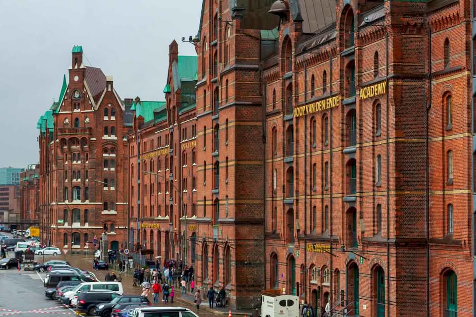 No trip through the historic Hamburg can be complete without a walk around the Speicherstadt, the largest warehouse district in the entire world. Everything in the area was built on top of thousands of oak piles. These huge brick buildings were once the main way that coffee, tea, and spices got to Germany.