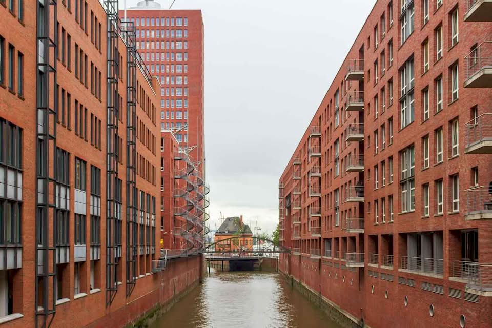 No trip through the historic Hamburg can be complete without a walk around the Speicherstadt, the largest warehouse district in the entire world. Everything in the area was built on top of thousands of oak piles. These huge brick buildings were once the main way that coffee, tea, and spices got to Germany.