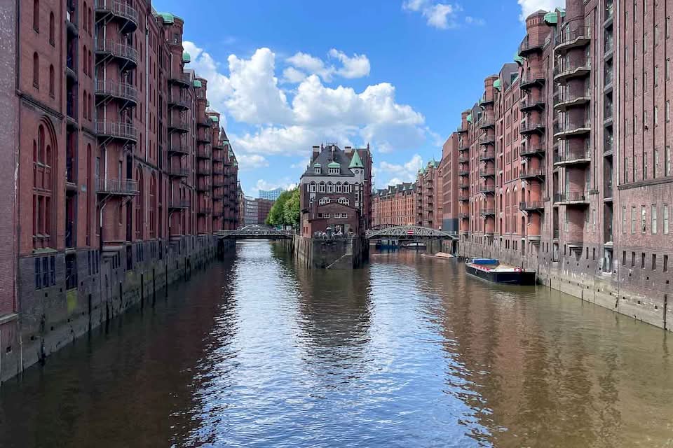 No trip through the historic Hamburg can be complete without a walk around the Speicherstadt, the largest warehouse district in the entire world. Everything in the area was built on top of thousands of oak piles. These huge brick buildings were once the main way that coffee, tea, and spices got to Germany.