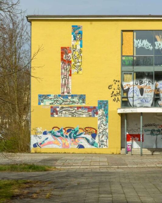 Even though the Eisenhüttenstadt murals are a bright feature of the city today, its roots go back to a time when borders changed and people came from Slavic countries. They were part of the final layer of this ideological construction. When you pass by a mosaic of a cosmonaut or a happy family on the side of a building, you are not enjoying pure art. They were placed there to help mend the wounds caused by the border changes, wars, and uprootings