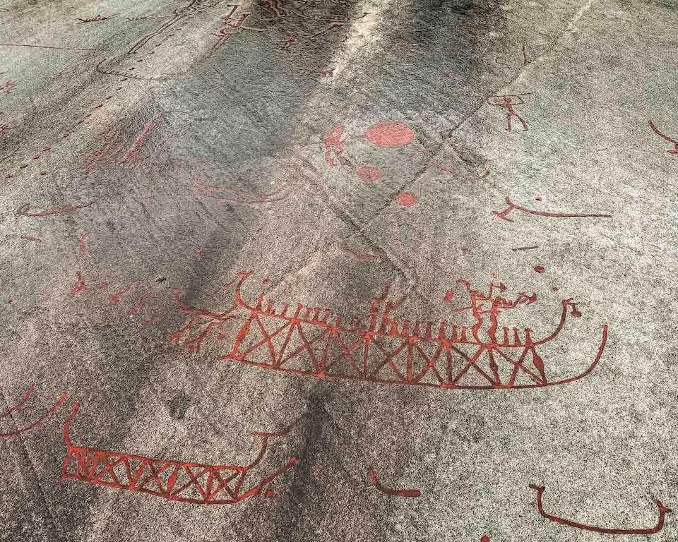 At least I managed to find my focus on time to stop and go take pictures of the fantastic Rock Carvings in Tanum. This group of petroglyphs is so wonderful that UNESCO named it a World Heritage Site in 1994. Within the World Heritage Area, approximately 600 panels contain thousands of images known as the Tanum petroglyphs. The ones you can see here are from the area near the Vitlycke Museum, and they made my entire day cycling in the rain so much better.