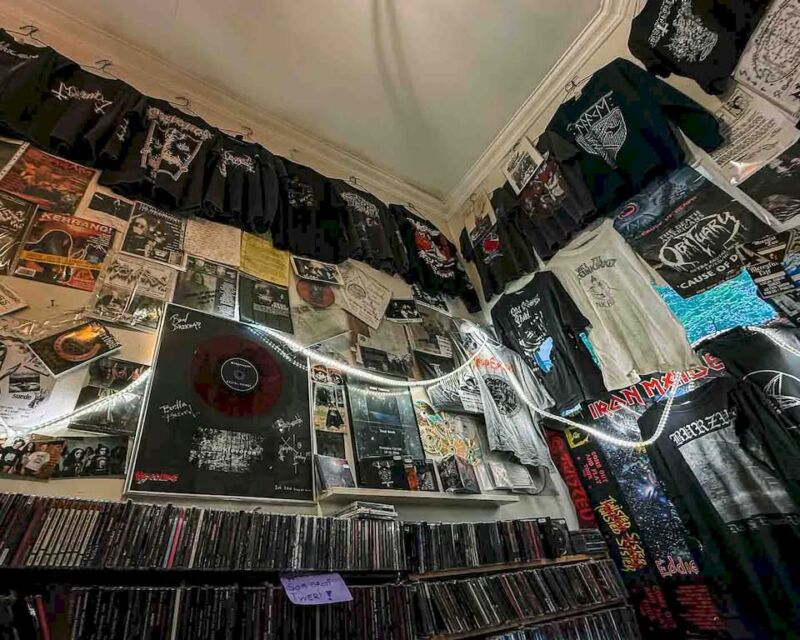Since I visited the building where he was murdered, I had to visit his old shop since it feels like an unofficial black metal museum. I even tried to buy a Mayhem shirt there, but they didn’t have it in my size, so I got a Neseblod Records shirt, and I’m more than happy about it.
