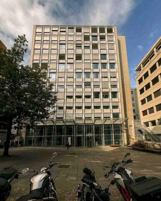 Before heading back to the hotel to pick up my bike and go to the airport, there was one last place that I wanted to visit. After walking for a few blocks, we arrived in a square that looked like many other places we passed by in Oslo. But this square is different since this is where the 2011 Norway attacks happened, led by far-right extremist Anders Behring Breivik. A car bomb exploded at Regjeringskvartalet, where today there is a museum there called 22. Juli-Senteret, but we didn’t have to visit it.