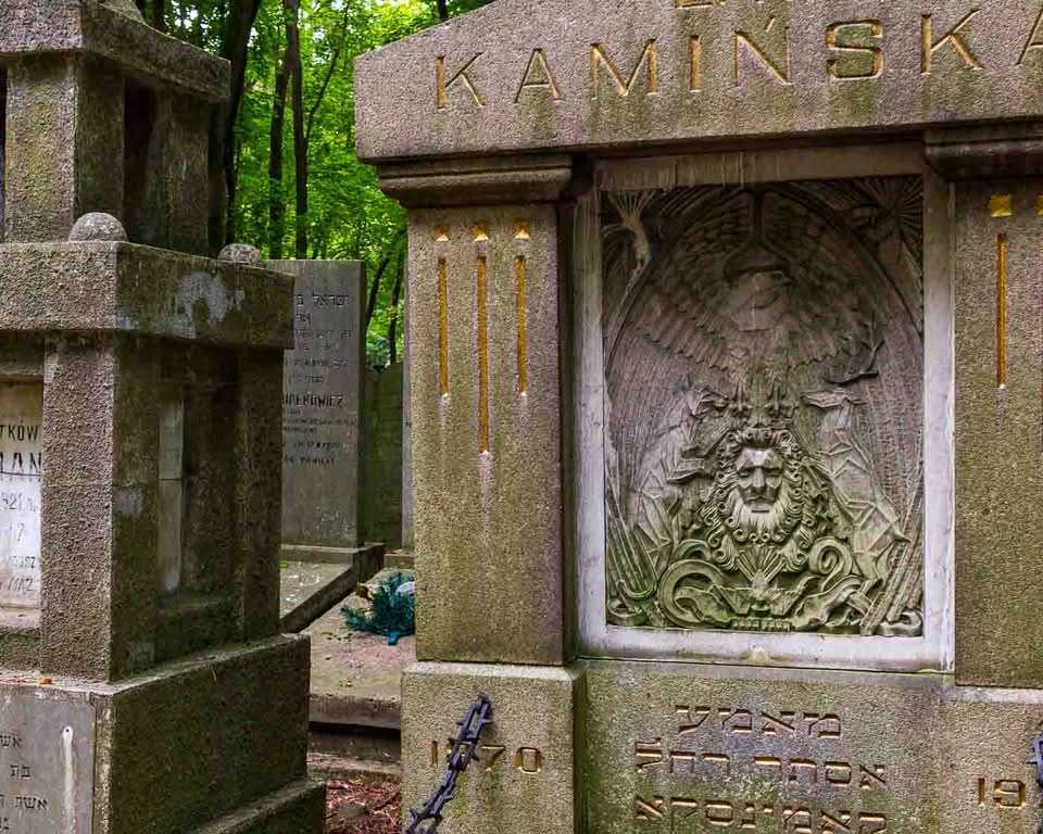 It is the Okopowa Street Jewish Cemetery. Spanning a bit over 33 hectares and containing upwards of 250,000 graves, it stands as the largest Jewish cemetery in Poland and one of the largest in Europe. There is a remarkable void in the landscape of the capital, where pre-war Warsaw is mainly unaltered and where moss, carved stone, and deep silence all serve as direct windows into the past.